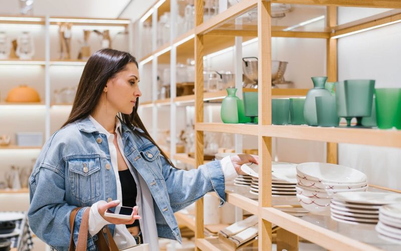 young-woman-chooses-crockery-in-a-home-improvement-shop.jpg