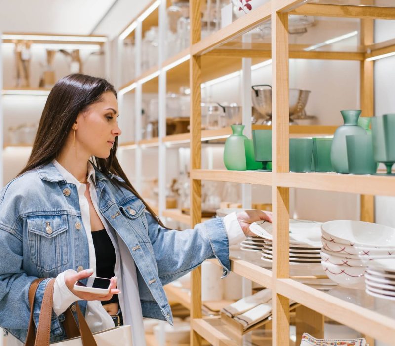 young-woman-chooses-crockery-in-a-home-improvement-shop.jpg